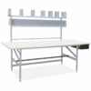 computer desk with two rolls of paper on top of it, part of the Deluxe Packing Table setup