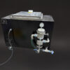 black box with a machine attached to it, resembling an industrial ultrasonic cleaner, part of the SLA 7000 product line