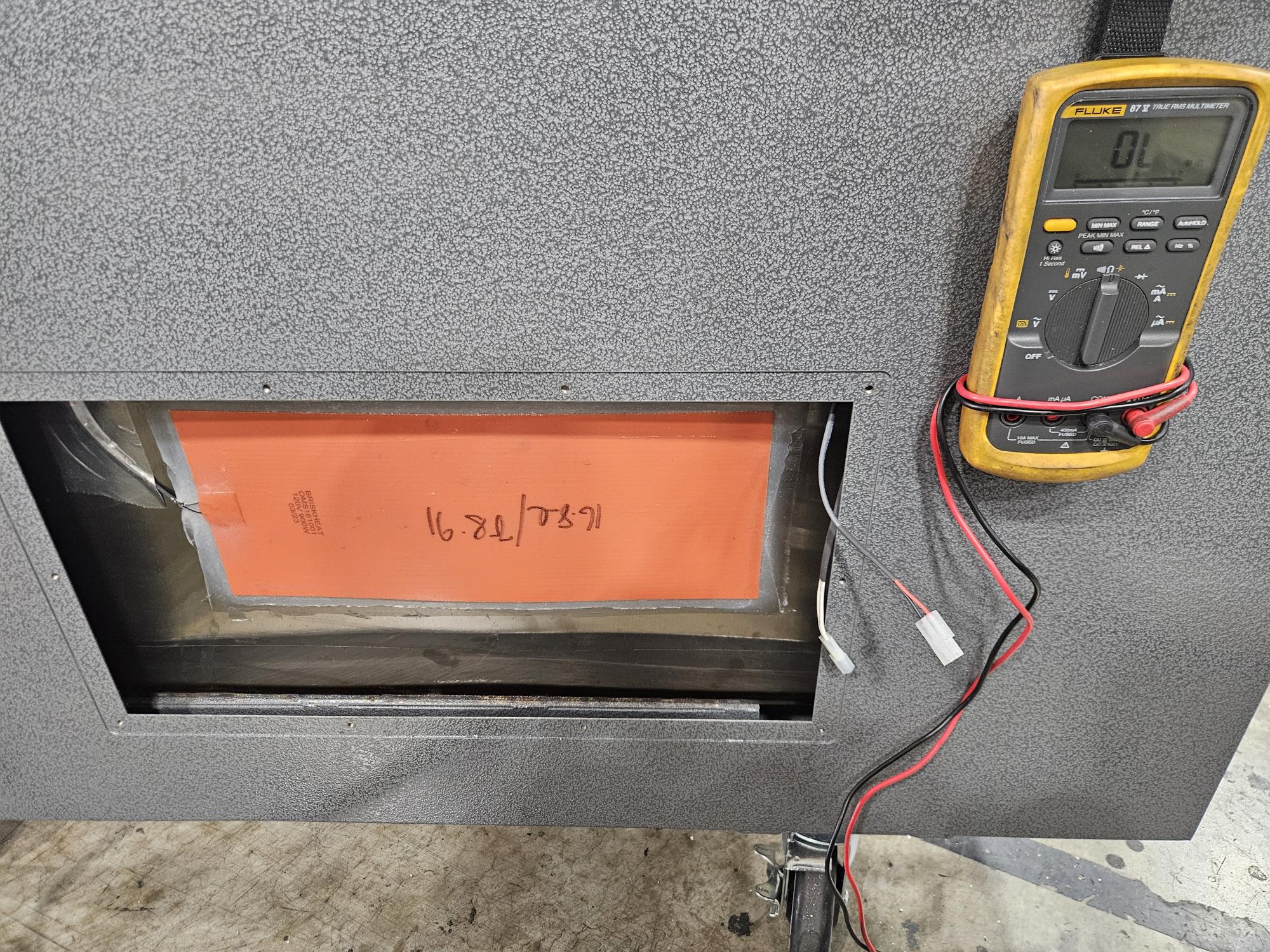 Heating pad ohms resistance check with multimeter on Omegasonics ultrasonic cleaner
