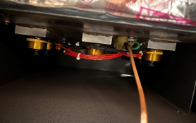 Normal bonded ultrasonic transducers secured underneath ultrasonic tank